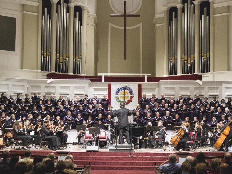 Choir singing with orchestra.