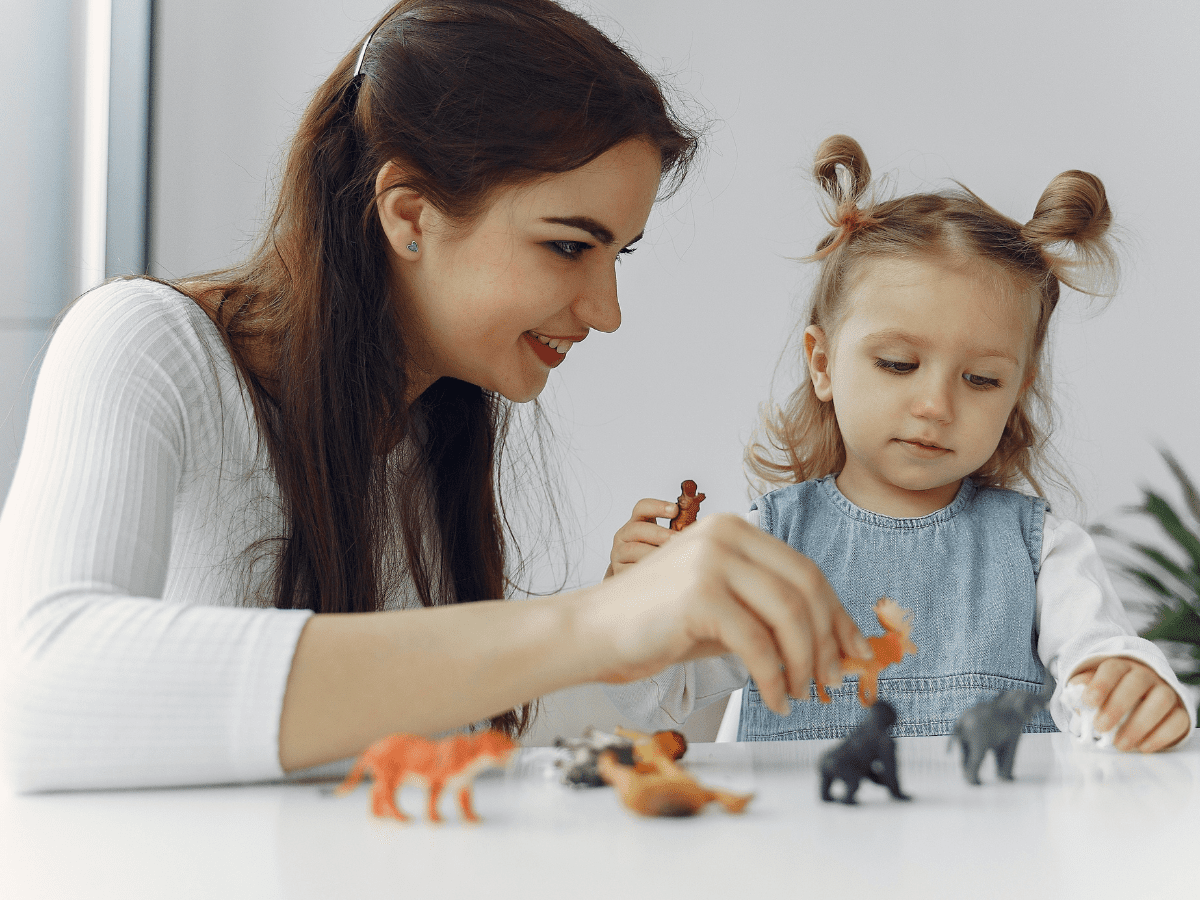 Teacher and child with toys 43