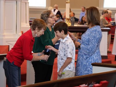 Communion server and person receiving communion