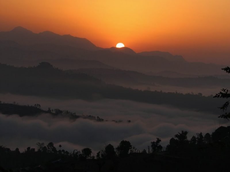 Photo of a sunrise with beautiful hues of orange and light.