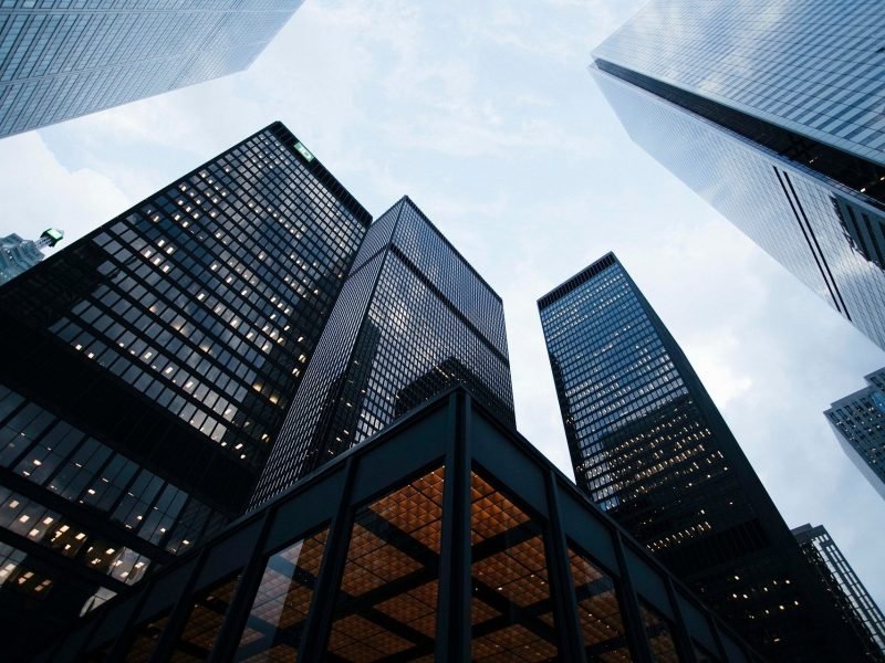 Photo of giant skyscrapers representing those in power.